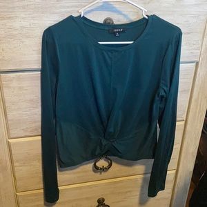 Women’s long sleeve top with twist detail at bottom